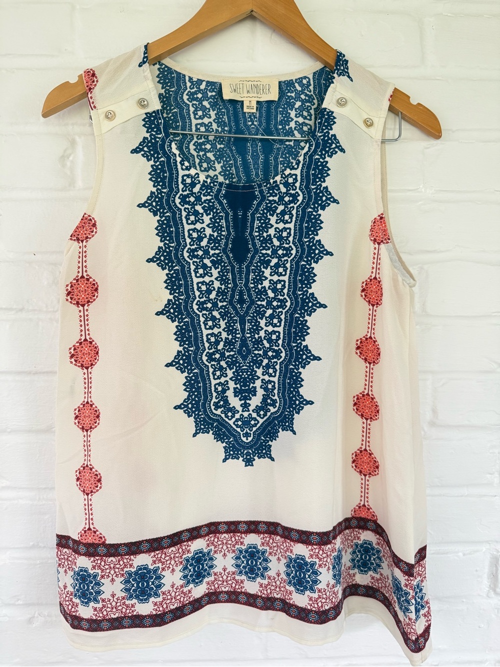 Sweet Wanderer Cream Sleeveless Top with Blue and Coral Embroidery